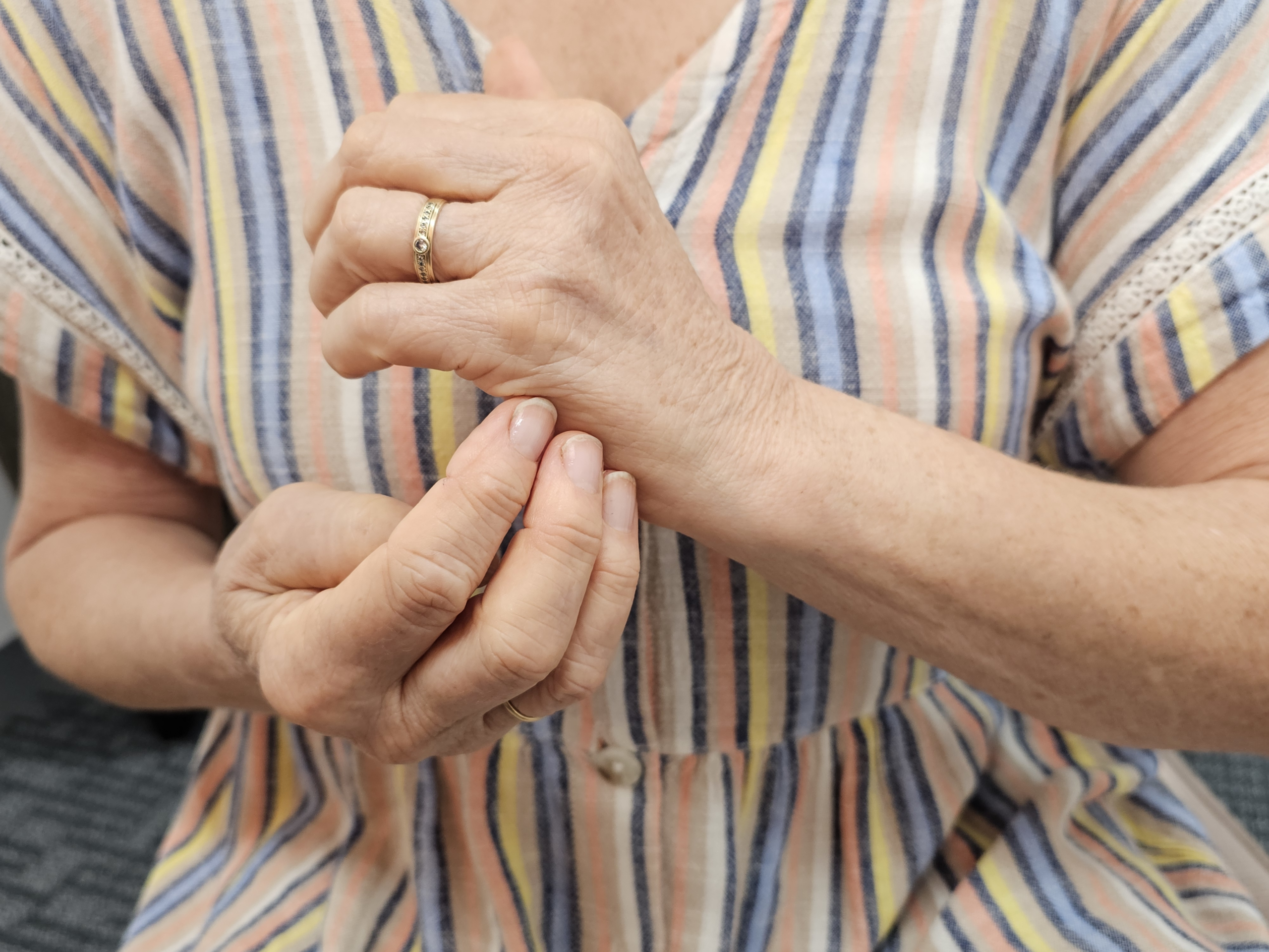 Hand demonstrating emotion freedom techniques (EFT)